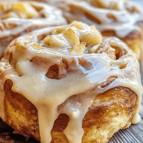 If you're looking for a delightful way to start your day or to sweeten up your brunch gatherings, look no further than these irresistibly soft and fluffy apple cinnamon rolls topped with luscious cream cheese frosting. This recipe combines the warm, comforting flavors of sweet apples and aromatic cinnamon, creating a treat that’s hard to resist. Each bite offers a perfect balance of sweetness and spice, making these rolls a versatile choice for any occasion—be it a cozy breakfast, a leisurely brunch, or a delightful dessert.